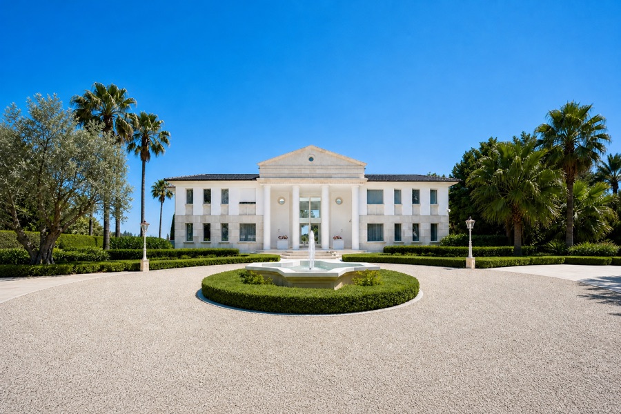 Neoclassical villa with a fountain and formal gardens
